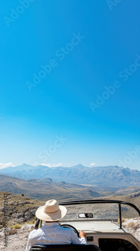 Adventurous road trip in scenic mountain landscape with off-road vehicle photo