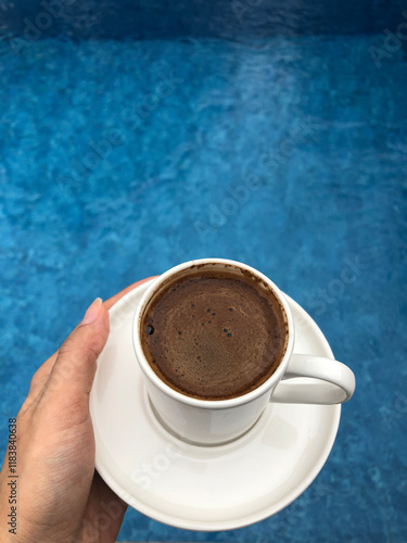 Wallpaper Mural a cup of turkish coffee on pool Torontodigital.ca