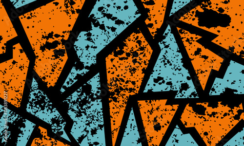 A vibrant, abstract pattern of orange and blue shapes with black outlines and a grunge texture overlay.