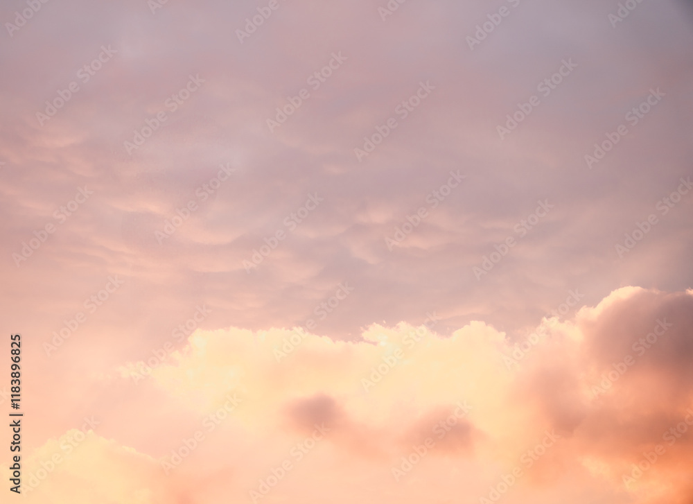 Serene Sunset Sky with Soft Pastel Clouds Illuminated by Warm Evening Light Serene Sunset Sky with Soft Pastel Clouds Illuminated by Warm Evening Light