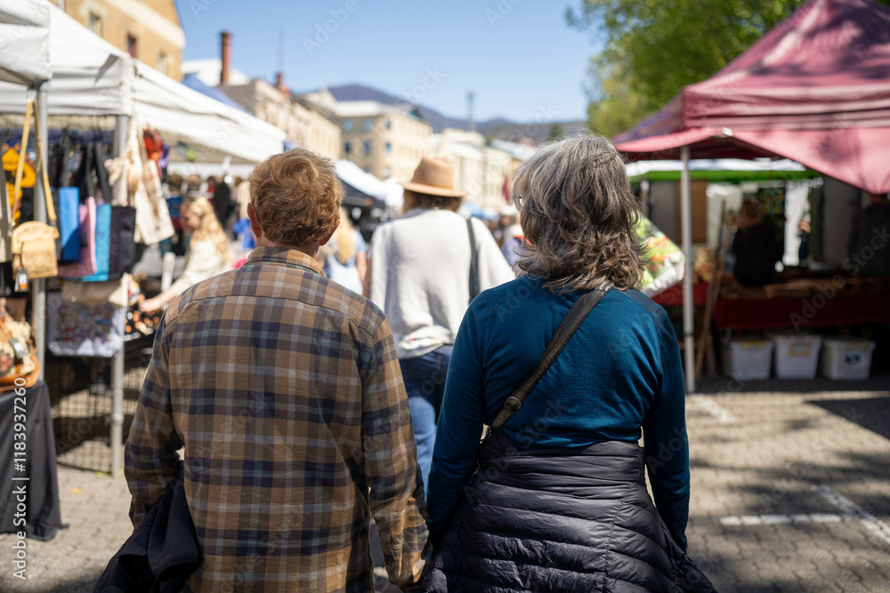tourist at farmer market, at salamanca market in hobart australia in town