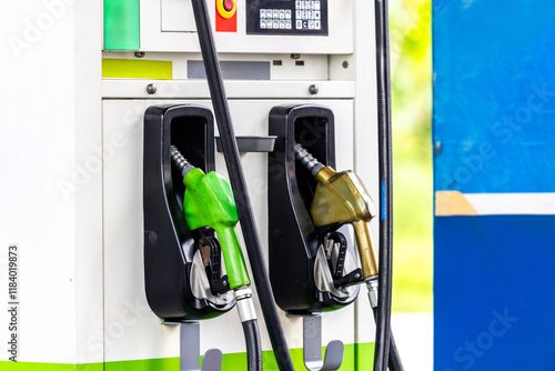Close up fuel nozzle of gas station. Colorful gas station nozzle