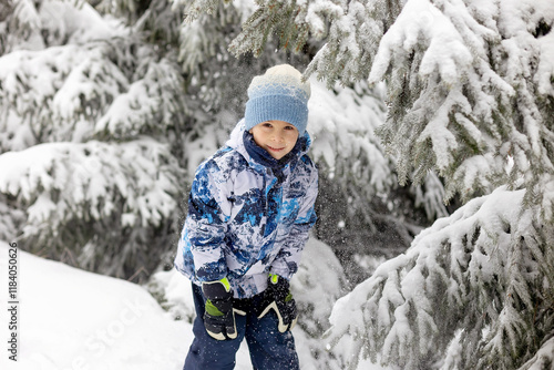 Wallpaper Mural Sweet happy children, brothers, playing in deep snow in forest, frosted trees and beautiful landscape Torontodigital.ca