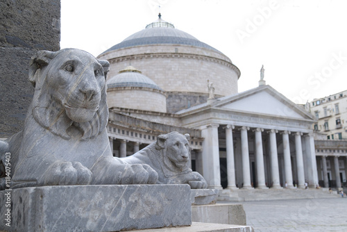 Tableau sur toile Stone lion at the Basilica di San Francesco di Paola in Piazza del Plebiscito, Naples, Campania, Italy