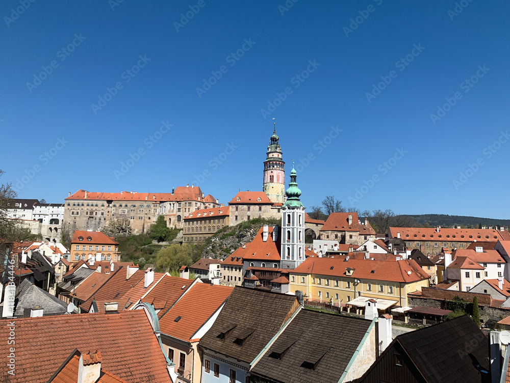 Top view of Český Krumlov, historic town with red rooftops Top view of Český Krumlov, historic town with red rooftops