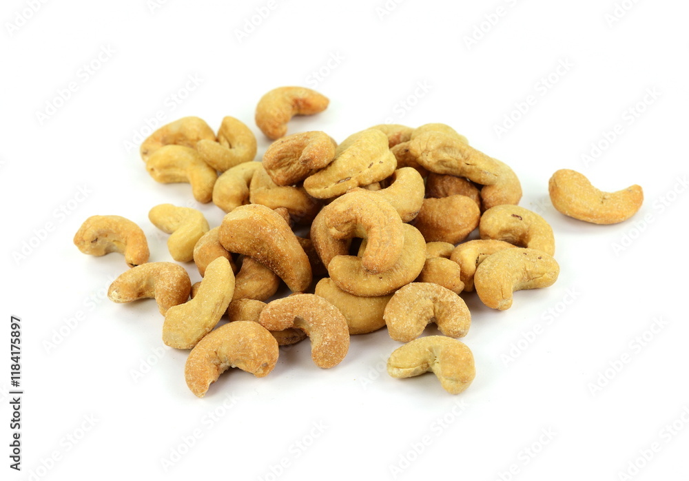Fototapeta premium Unshelled roasted cashew nuts isolated on white background