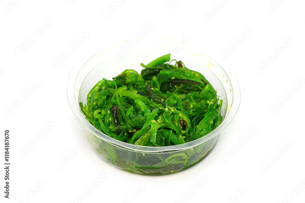Heap of organic Japanese Wakame salad isolated on white background. Edible Green Algae, Sea Vegetable Isolated. Green Chuka Seaweed Salad Isolated on White Background. Edible Seaweed Heap of organic Japanese Wakame salad isolated on white background. Edible Green Algae, Sea Vegetable Isolated. Green Chuka Seaweed Salad Isolated on White Background. Edible Seaweed