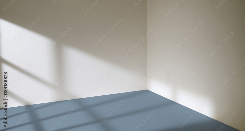 Sunlight from the window shines on the empty room walls and floor Sunlight from the window shines on the empty room walls and floor
