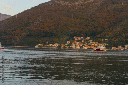 Balkan houses under the mountain at the Bay of Kotor, Montenegro, photo