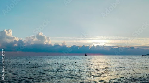 Mediterranean Beach Scene Swimmers and Traditional Boat Horizon
