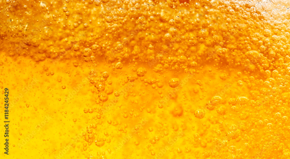 Close up bright orange Oil or beer splash texture and nature waves, Beautiful waves curve and little bubbles smooth for graphic design and background, Oil Bubbles, Soft beer bubbles, Selective focus Close up bright orange Oil or beer splash texture and nature waves, Beautiful waves curve and little bubbles smooth for graphic design and background, Oil Bubbles, Soft beer bubbles, Selective focus