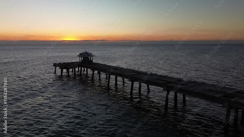 Aerial view of an abandoned fishing pier at sunrise Aerial view of an abandoned fishing pier at sunrise