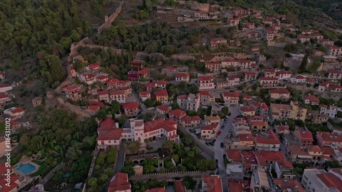 Aerial view of Nafpaktos Venetian Port at sunrise with historic fortress and charming old town, Nafpaktos, Greece. photo