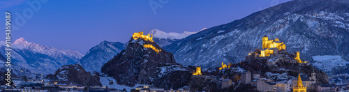 Sion, Switezrland - December 25. 2024: Panorama of the Swiss castles of Valere Basilica and Tourbillon in Sion - the canton of Valais, Switzerland photo