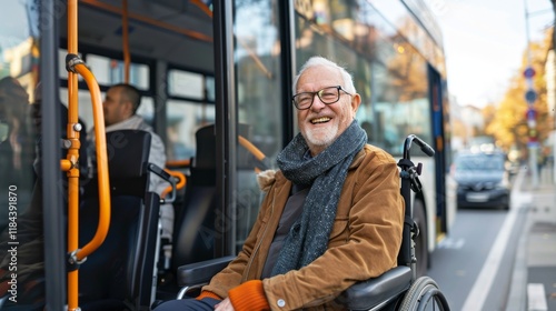 A senior man in a wheelchair, smiling as he boards a modern public transport bus with the help of a friendly attendant. 