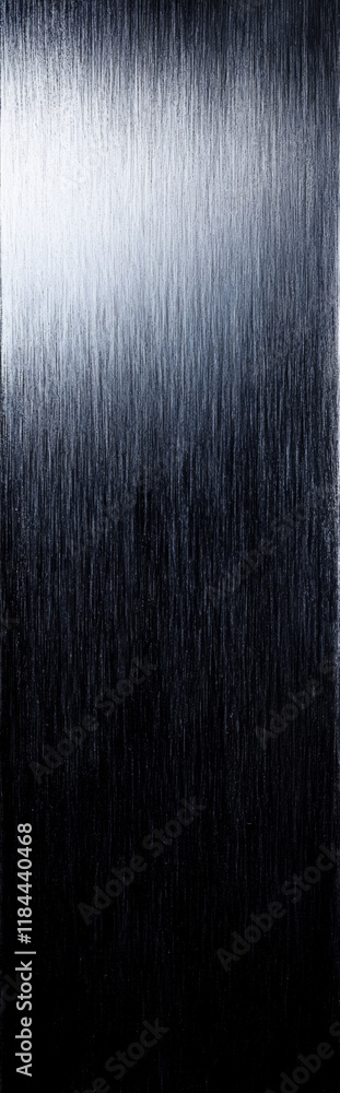 Brushed graphite gray metal texture. Dark metallic surface with sleek streaks. Brushed graphite gray metal texture. Dark metallic surface with sleek streaks.