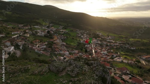 Wallpaper Mural National Flag of Portugal, Village and Green Hilly Landscape at Sunset. Serra de Montejunto Mountains. Aerial View. Moving Forward, Tilt Down Torontodigital.ca