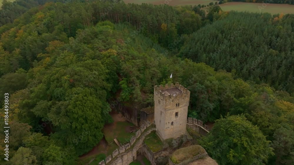 Aerial view of the abandoned castle surrounded by a beautiful forest, Burg Helfenburk, Czech Republic. Aerial view of the abandoned castle surrounded by a beautiful forest, Burg Helfenburk, Czech Republic.