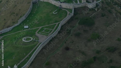 Aerial view of Spis Castle at sunrise with beautiful medieval architecture and scenic landscape, Spisske Podhradie, Slovakia. photo