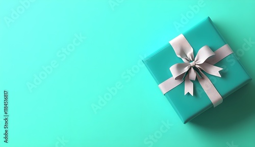 Wallpaper Mural Elegant gift box with a soft satin ribbon on a vibrant turquoise backdrop, perfect for celebrations, birthdays, holidays, and special occasions showcasing a sense of joy and surprise. Torontodigital.ca