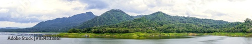 panoramic view of beautiful mountain lake located in Indonesia. The mountain, lake and cloudy sky panorama