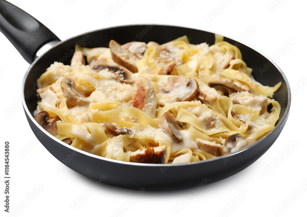 Tasty Alfredo pasta with chicken and mushrooms in frying pan isolated on white Tasty Alfredo pasta with chicken and mushrooms in frying pan isolated on white