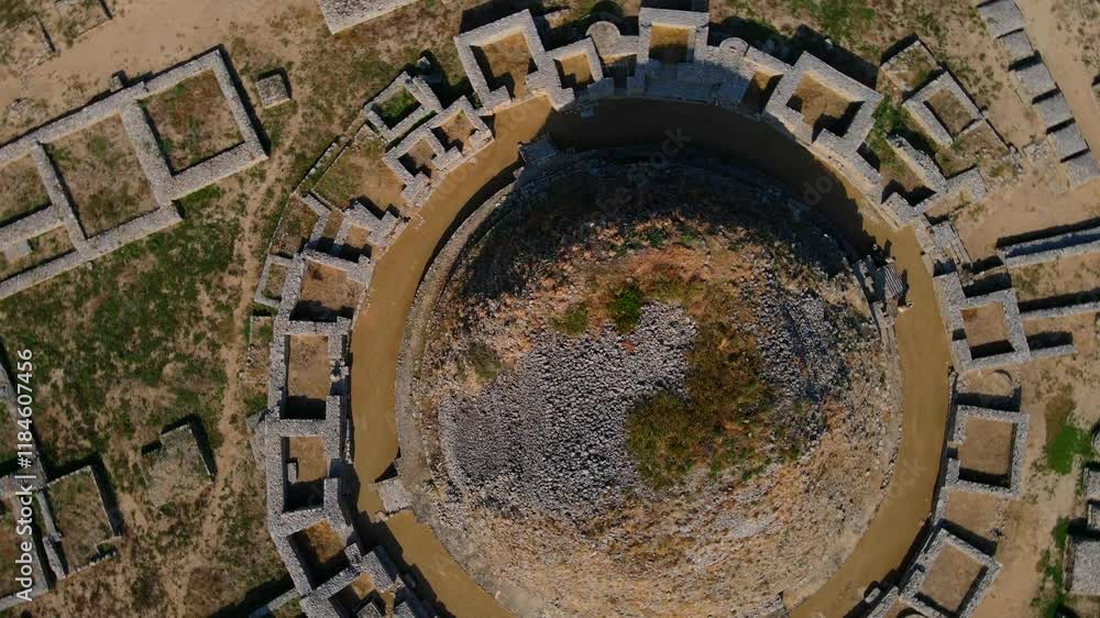 Aerial view of ancient ruins and stone structures at Dharmarajika Stupa, Taxila, Pakistan. Aerial view of ancient ruins and stone structures at Dharmarajika Stupa, Taxila, Pakistan.