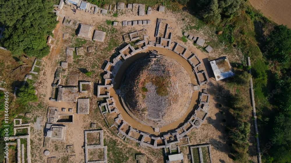 Aerial view of Dharmarajika Stupa and ancient ruins at an archeological site, Taxila, Pakistan. Aerial view of Dharmarajika Stupa and ancient ruins at an archeological site, Taxila, Pakistan.