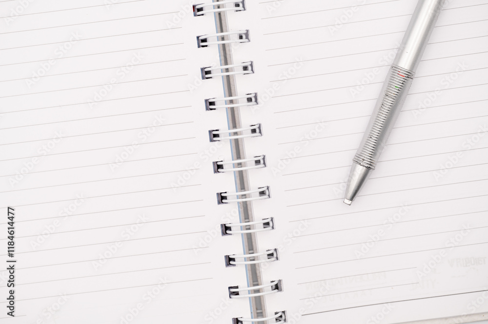 Writer's Ready: Open Notebook with Pen on Crisp White Pages Writer's Ready: Open Notebook with Pen on Crisp White Pages