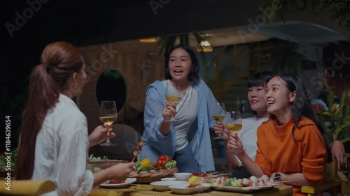 Wallpaper Mural Cheerful friends enjoying a celebratory dinner, raising their glasses in a toast of friendship and togetherness Torontodigital.ca