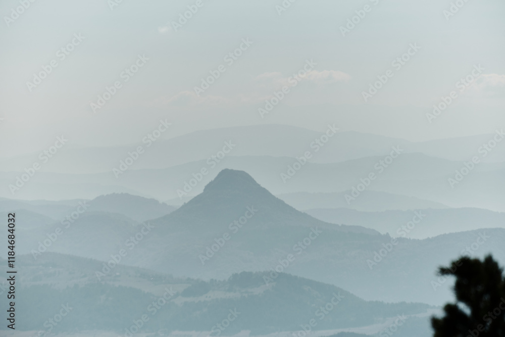 Blue mountains range and hills. Beautiful minimalistic landscape for nature background. The nature of southwestern Serbia, view from Tornik resort near Zlatibor.