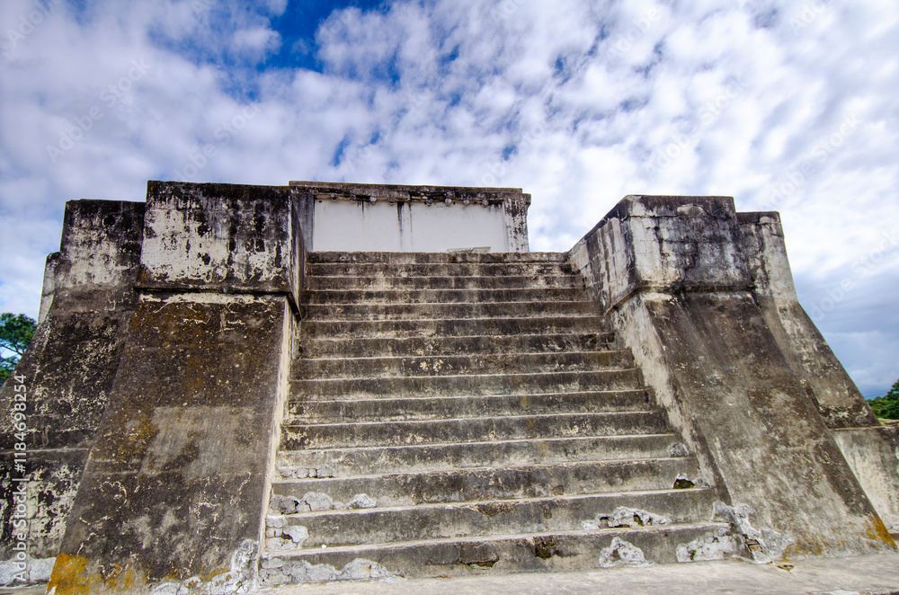 Restored remains of the Mayan city of Zaculeu. Imposing pyramid-shaped buildings, surrounded by mountains close to the clouds. Restored remains of the Mayan city of Zaculeu. Imposing pyramid-shaped buildings, surrounded by mountains close to the clouds.