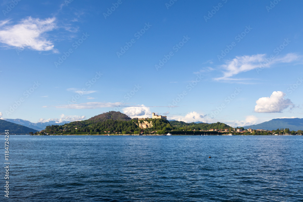Fototapeta premium Vista panoramica da Arona in Piemonte sul Lago Maggiore e sullo sfondo il Castello di Angera sul lato Lombardo