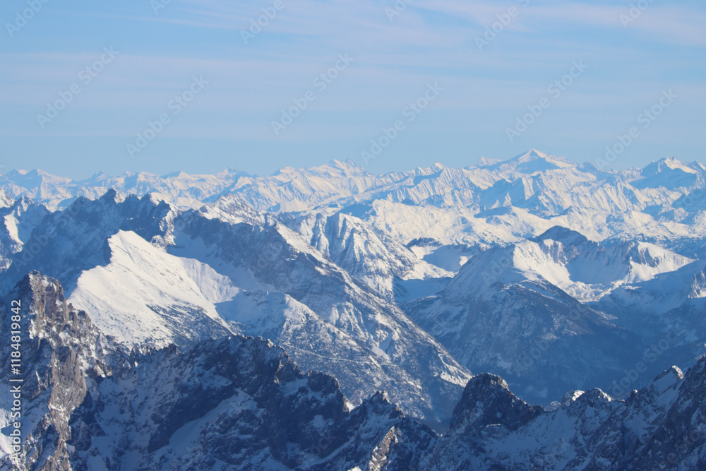 Obraz premium Snow covered mountains peaks in winter