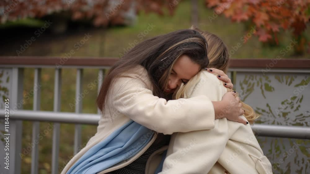 A closeup view of two friends sharing a joyful and memorable moment outdoors amid beautiful autumn scenery A closeup view of two friends sharing a joyful and memorable moment outdoors amid beautiful autumn scenery