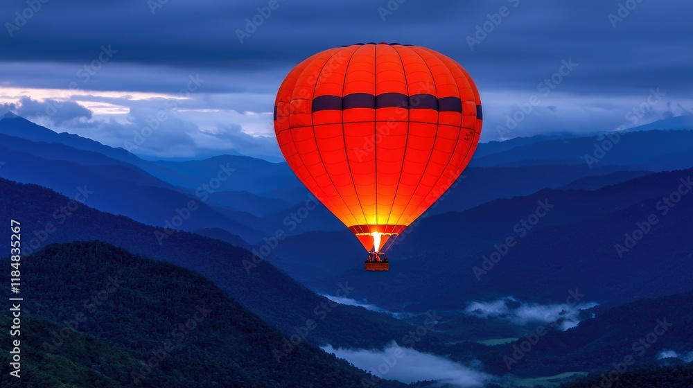 Fototapeta premium Hot air balloon flight over scenic mountains at dusk nature photography peaceful atmosphere aerial view