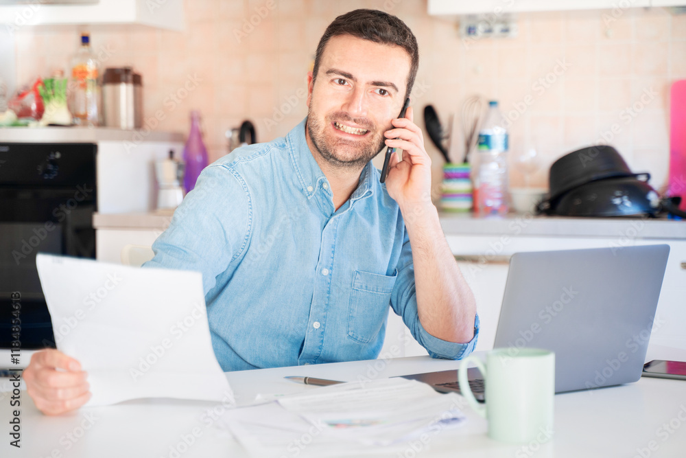 Fototapeta premium One man making a business all in the kitchen at home