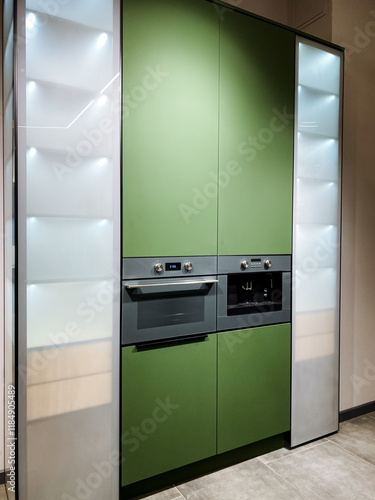Explore the cuttingedge world of modern kitchen design that showcases stunning green cabinets paired beautifully with builtin appliances for a sleek, sophisticated look