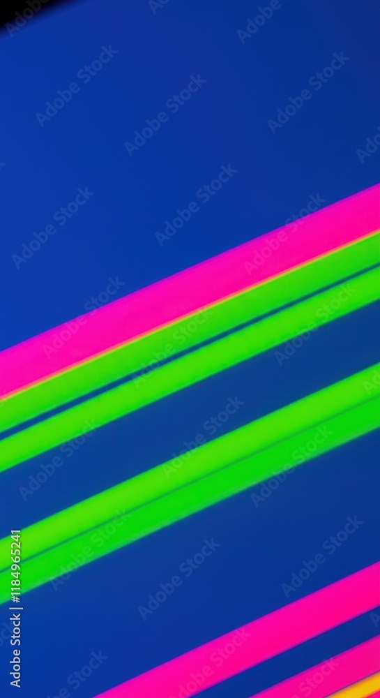 Fototapeta premium Colorful neon stripes on blue background - modern abstract design
