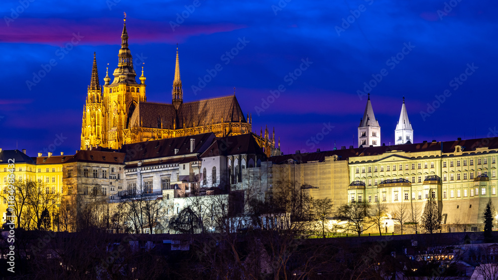 Fototapeta premium Blue hour after a fiery sunset over historic Prague - with a detail of the iconic Prague Castle