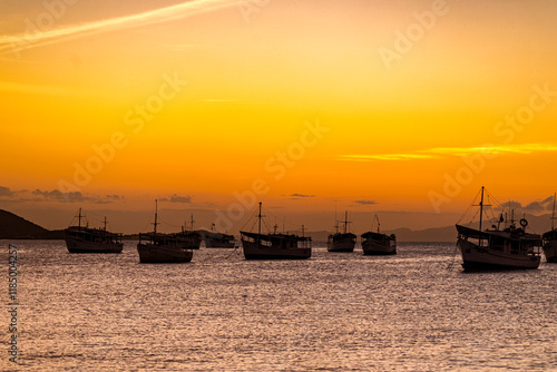 Landscape themes: Fishing boats in Juan Griego Bay at sunset. Margarita Island, Venezuela. photo