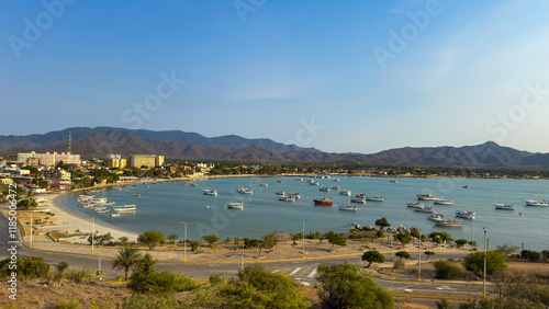 Travel themes: Panoramic view of Juan Griego bay at sunset in Margarita island. Venezuela photo