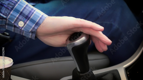 Obraz na płótnie Driver changing gear with manual transmission gearbox w salonie