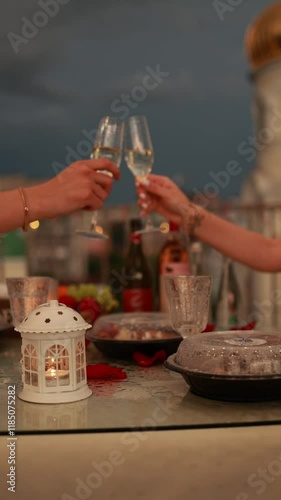Romantic Dinner on Rooftop with Toasting Glasses, Evening Lights, Celebratory Evening Atmosphere Concept