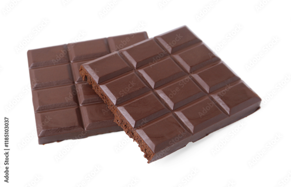Pieces of delicious dark chocolate bar isolated on white Pieces of delicious dark chocolate bar isolated on white