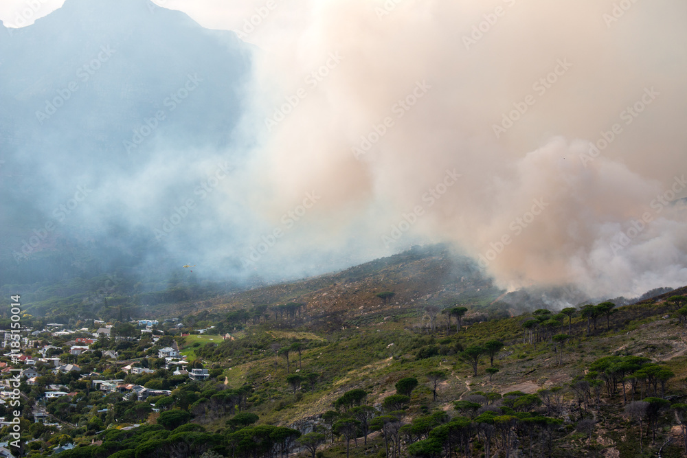 Helicopters trying to contain the fire at the foot of the Table Mountain, Cape Town, South Africa Helicopters trying to contain the fire at the foot of the Table Mountain, Cape Town, South Africa