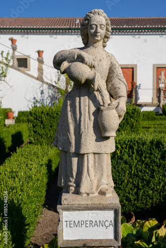 Stone statue depicting the temperance belonging to the episcopal garden of the city of Castelo Branco photo