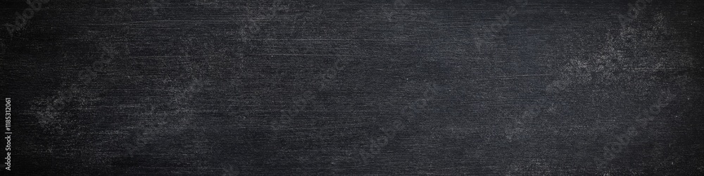 A textured black surface resembling a chalkboard or slate. A textured black surface resembling a chalkboard or slate.