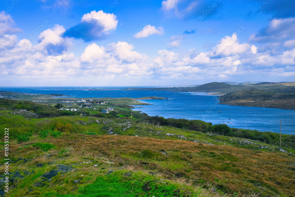 Donegal Ireland - A stunning and scenic view of a tranquil coastline enriched with vibrant greenery and calm, serene waters Donegal Ireland - A stunning and scenic view of a tranquil coastline enriched with vibrant greenery and calm, serene waters