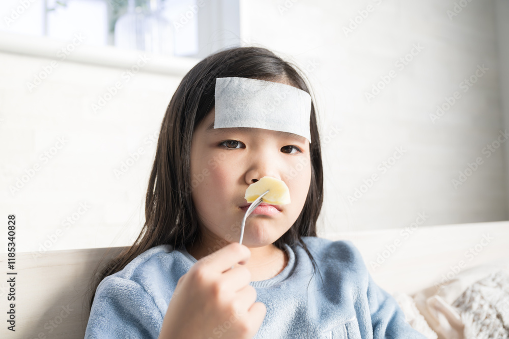 A child who has a cold and lacks energy and appetite but eats apples A child who has a cold and lacks energy and appetite but eats apples
